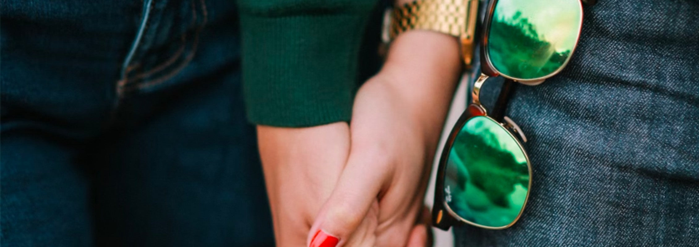 close up of a couple holding hands