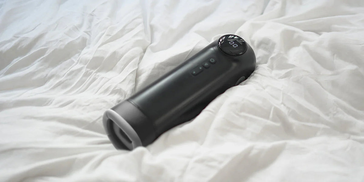 male masturbator lying on bed
